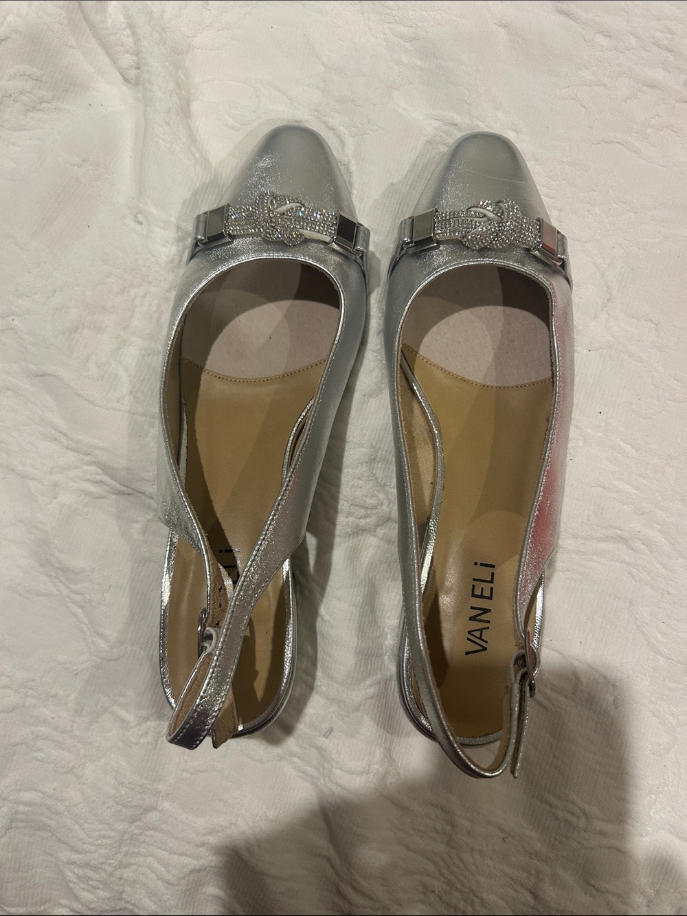 Vaneli Metallic Silver Slingback Flats with Crystal Buckle Detail.